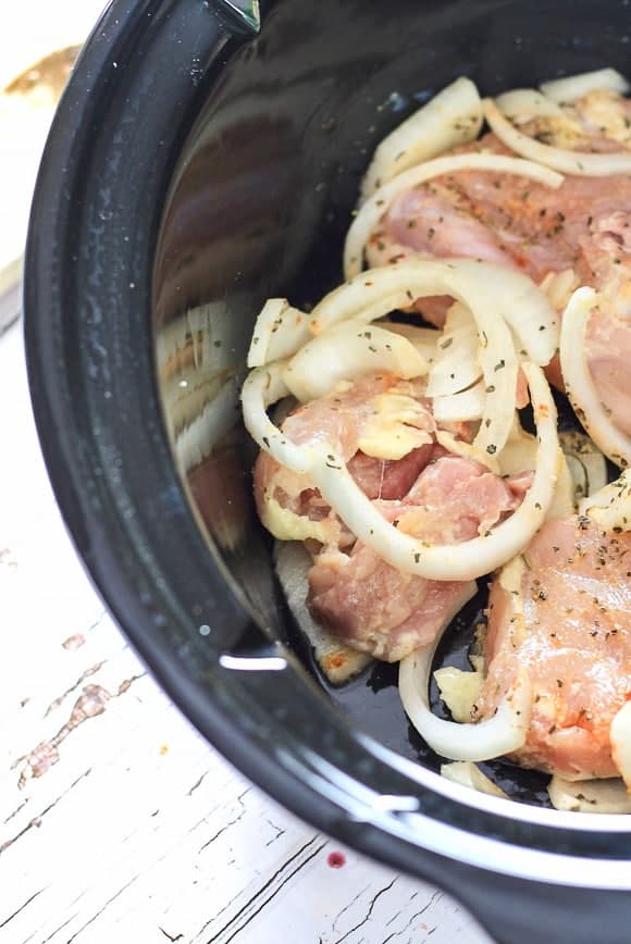 slow cooker greek chicken before cooking in a slow cooker