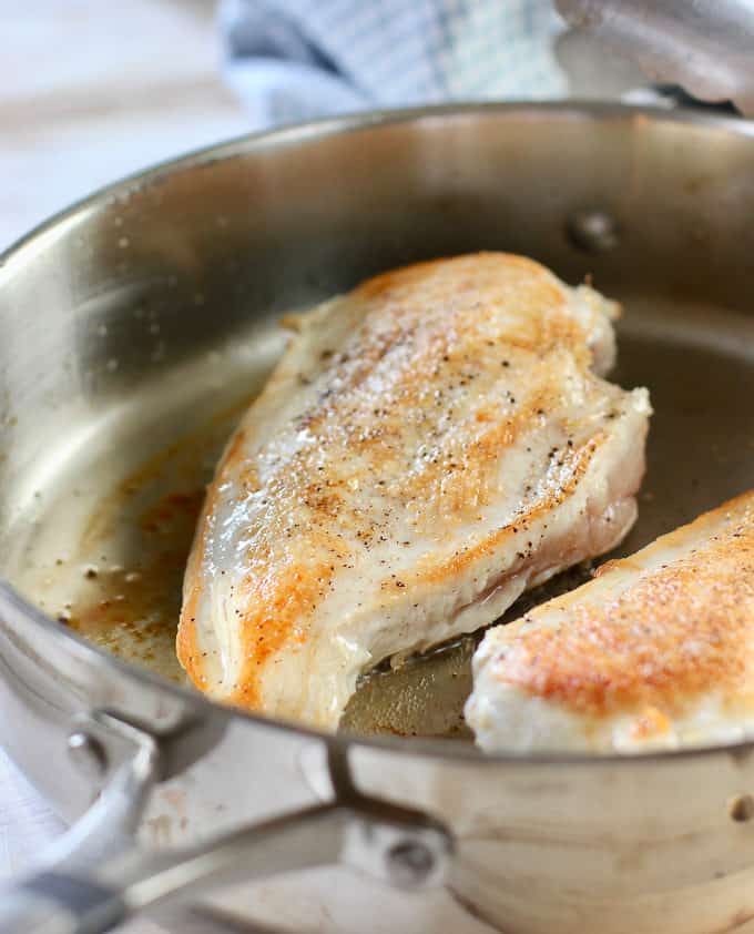 chicken breasts seared in a pan