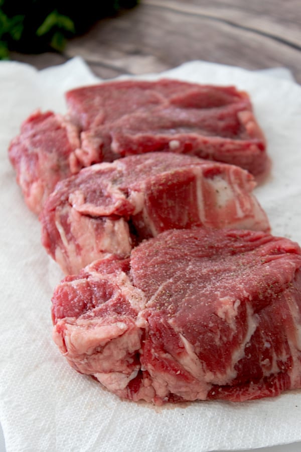 steaks resting on paper towel