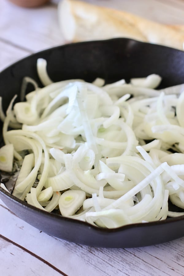 sliced onions in a pan