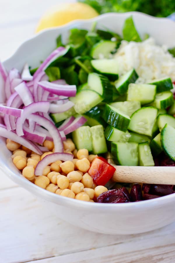 salad ingredients in white bowl