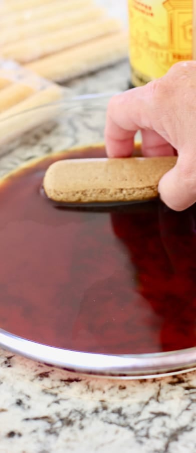 dipping lady fingers in coffee