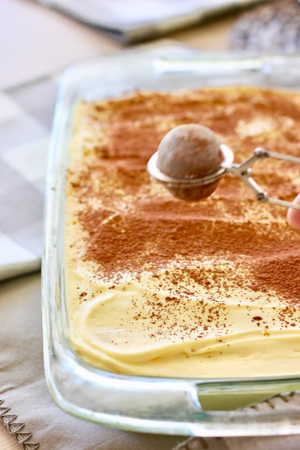 sprinkle cocoa on Tiramisu