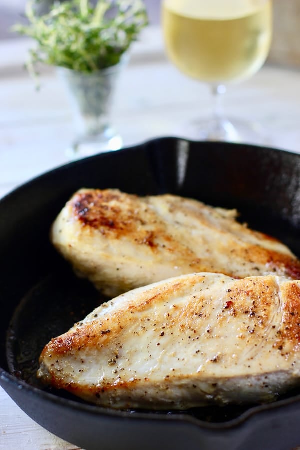 seared chicken breast in cast iron skillet