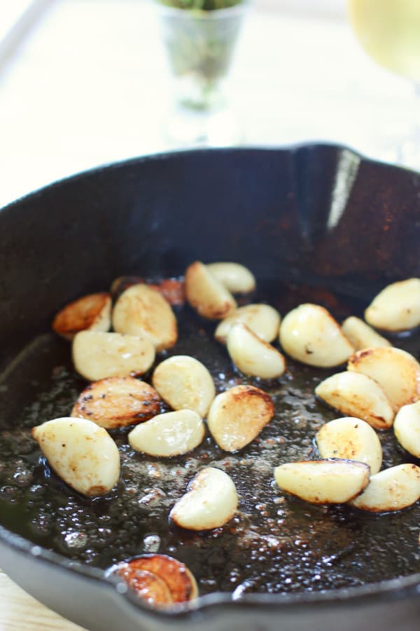 garlic saute in cast iron pan