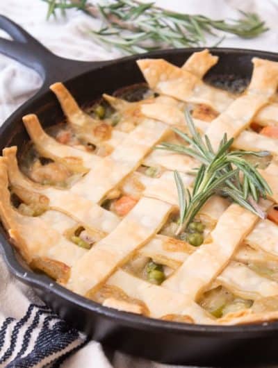 chicken pot pie fresh out of the oven in a black cast iron skillet