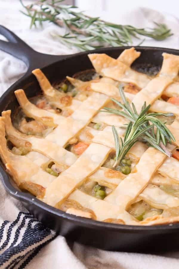 chicken pot pie fresh out of the oven in a black cast iron skillet