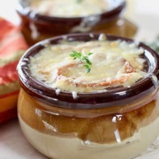 french onion soup in a beautiful brown bowl