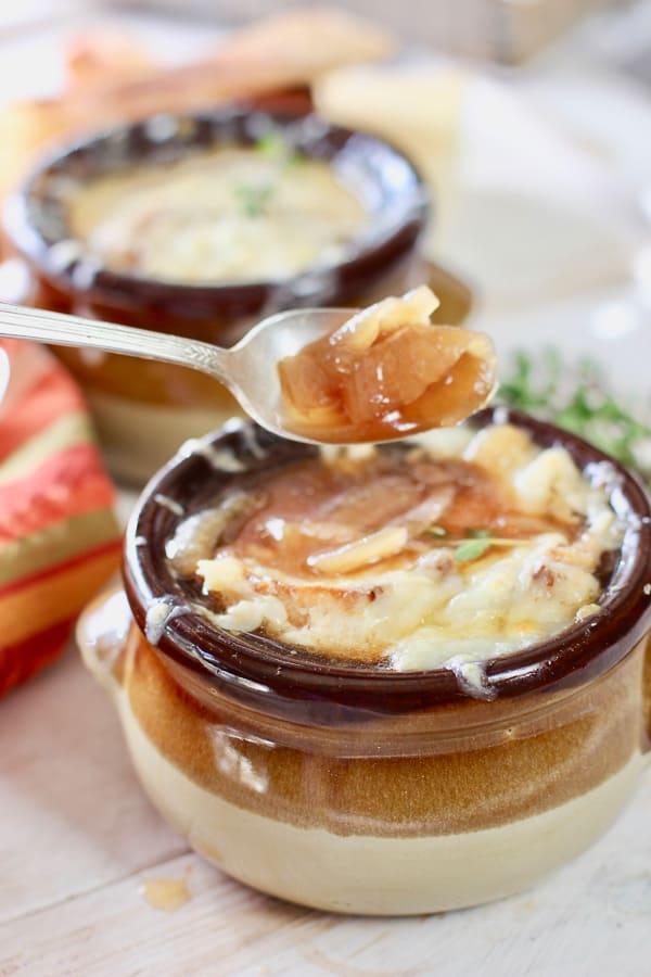 french onion soup spooned up