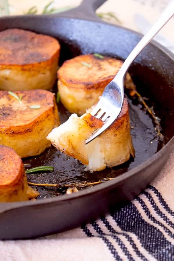 showing fondant potato being eaten with fork