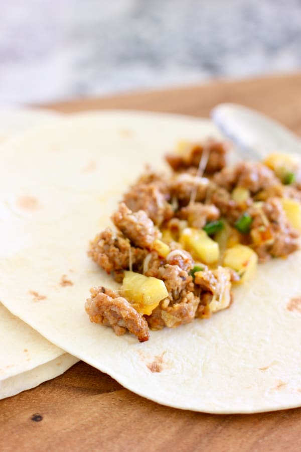 sausage and potato stuffed into a tortilla