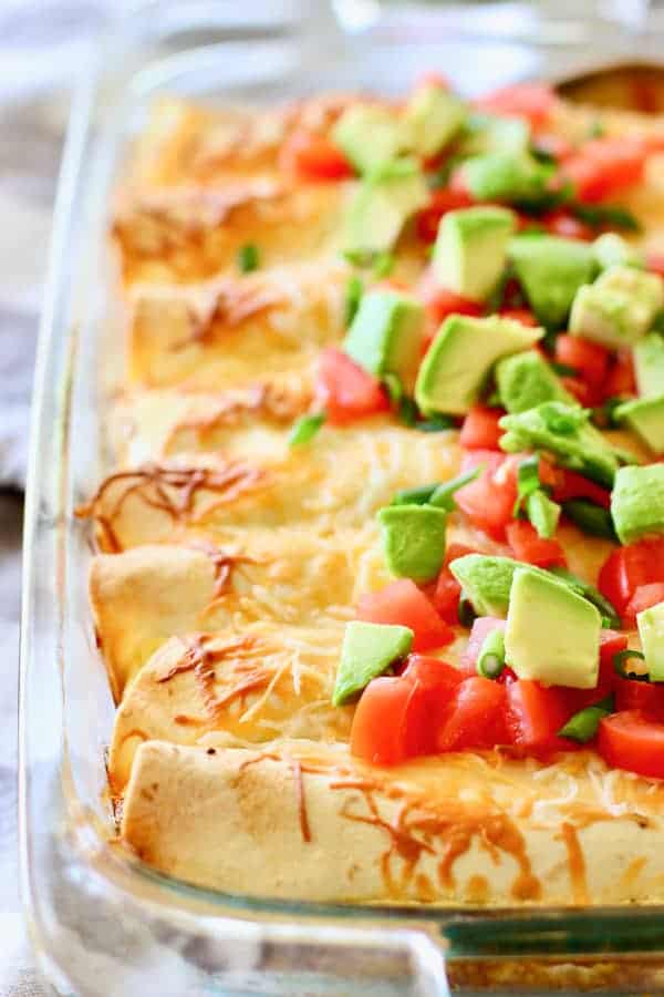 breakfast burritos in a clear casserole dish