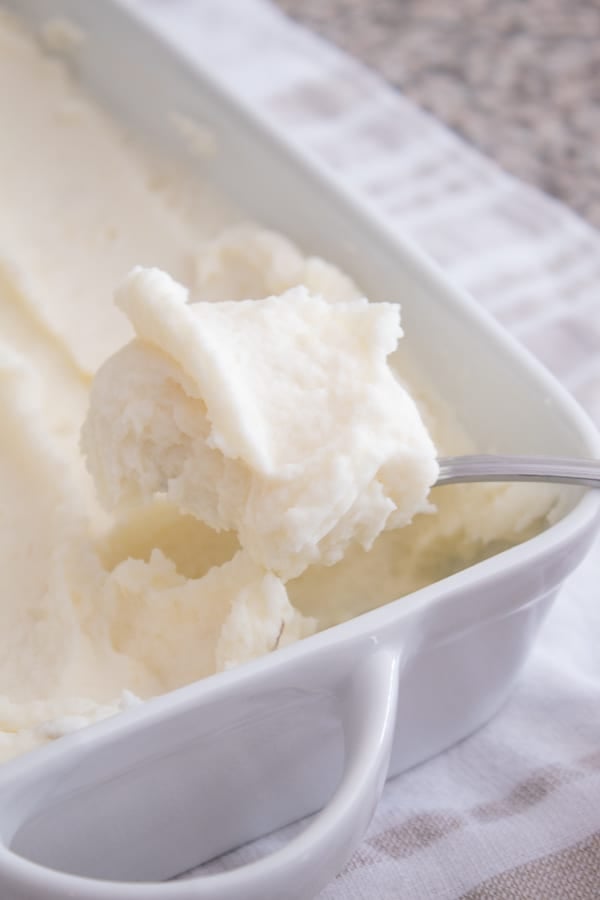 a casserole dish with whipped mashed potatoes