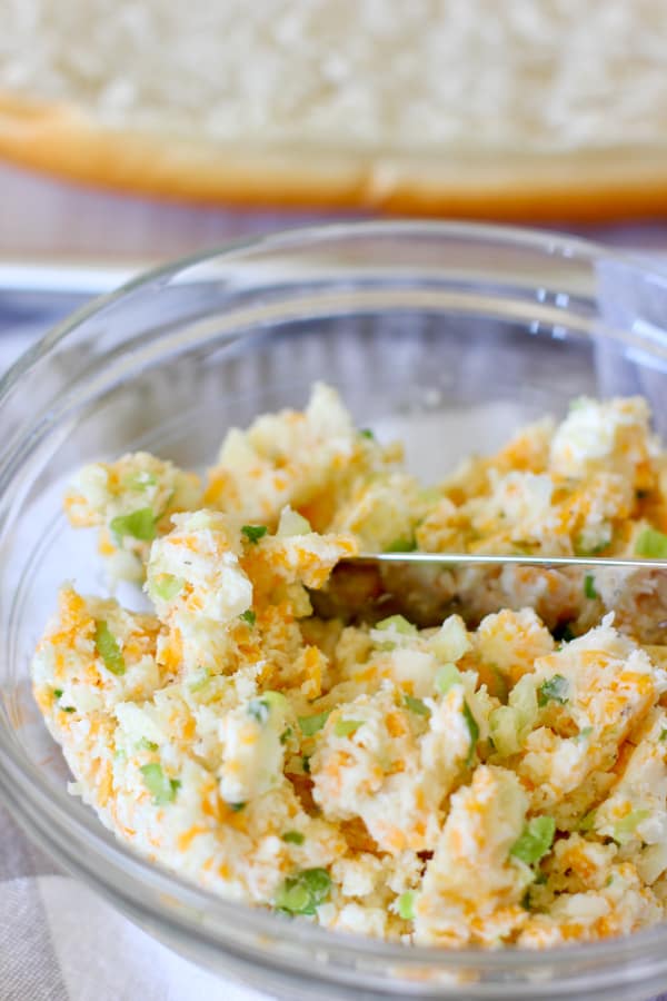 butter cheese and spices in a mixing bowl