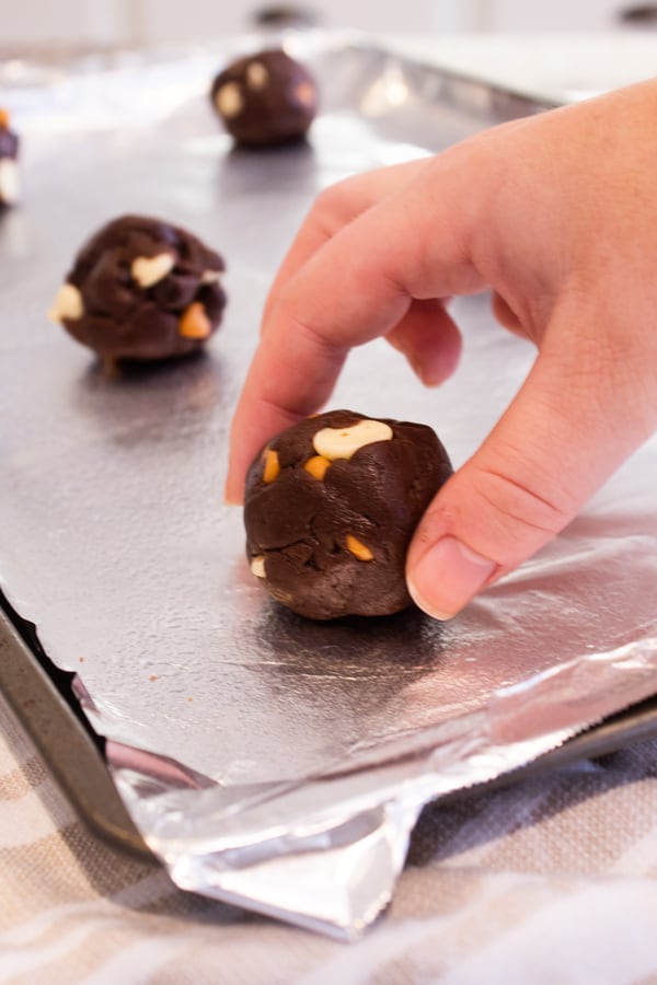 rolling brownie mix dough into balls