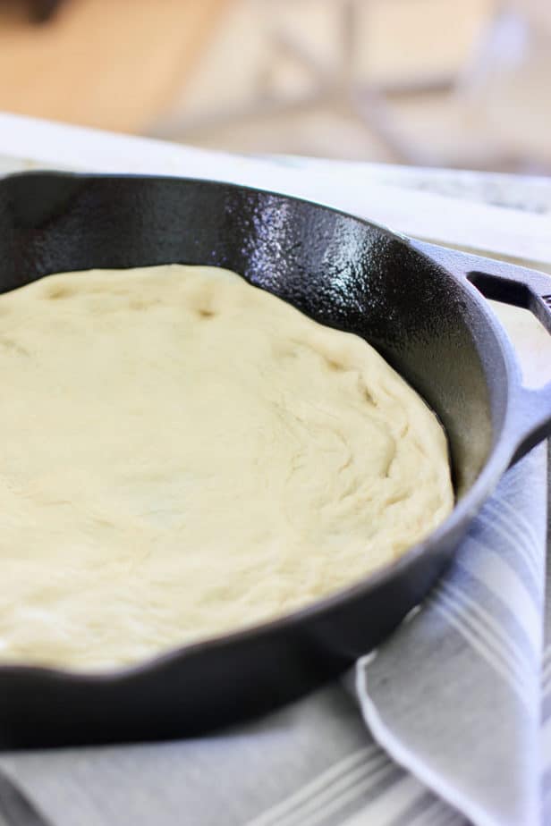 pizza dough in cast iron skillet