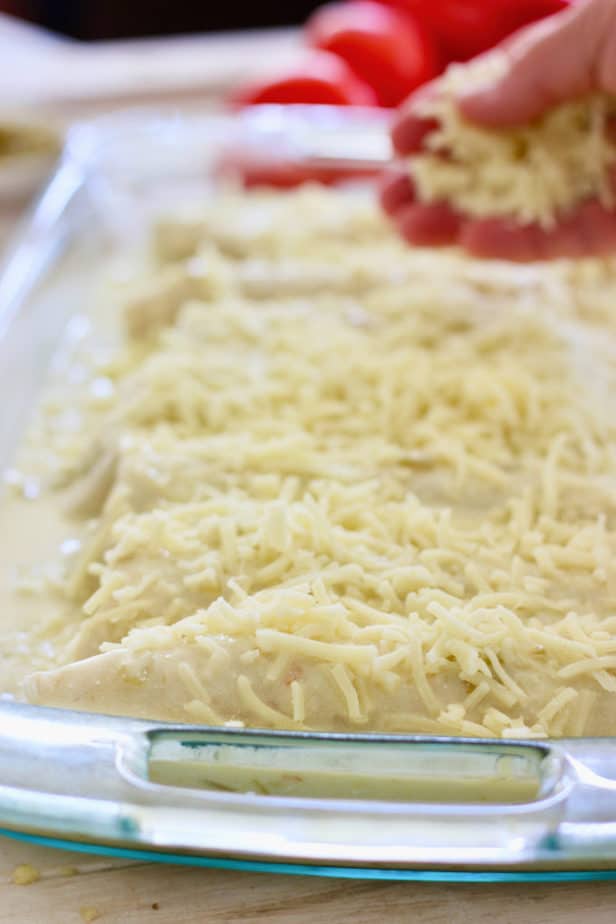 sprinkle Monterey jack over rolled and stuffed enchiladas