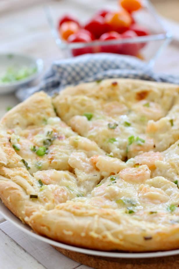 shrimp pizza on a plate to be served