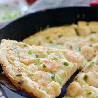 a slice of Shrimp Pizza in a pan