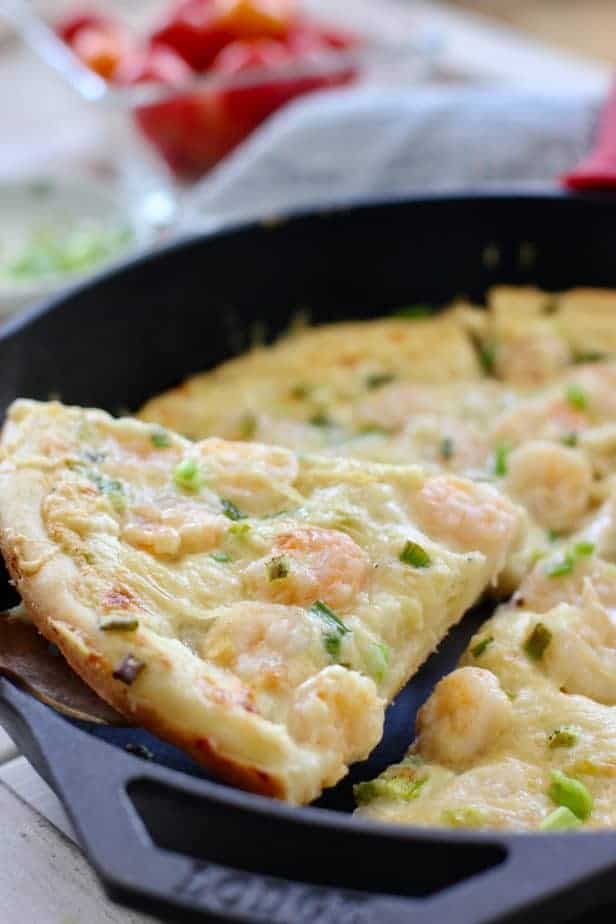 a slice of Shrimp Pizza in a pan