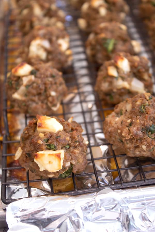 cooked great meatballs on cookie sheet