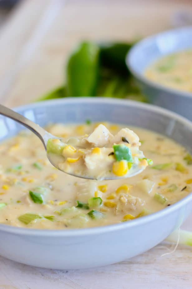 Chicken and Corn Chowder being scooped up in a spoon