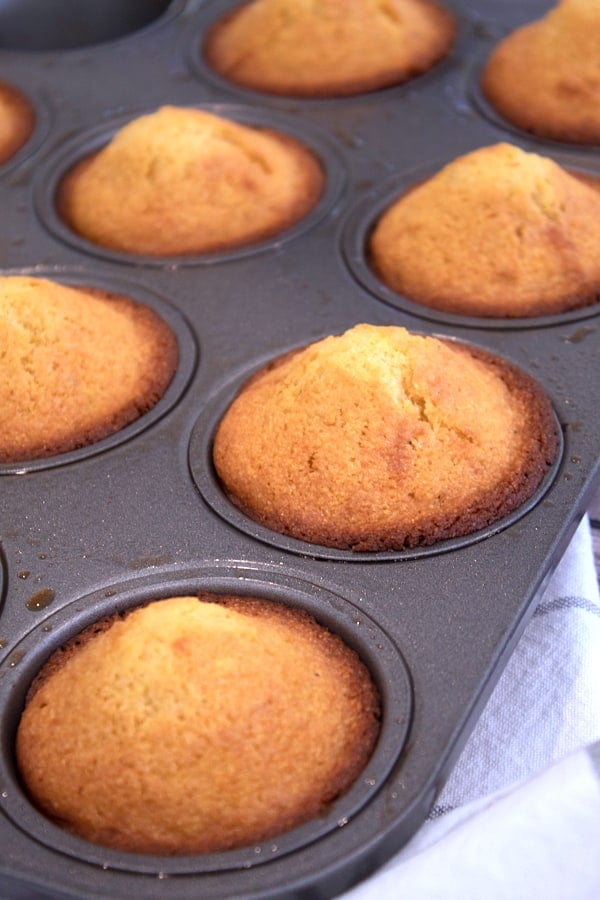 corn muffins in muffin tin out of the oven
