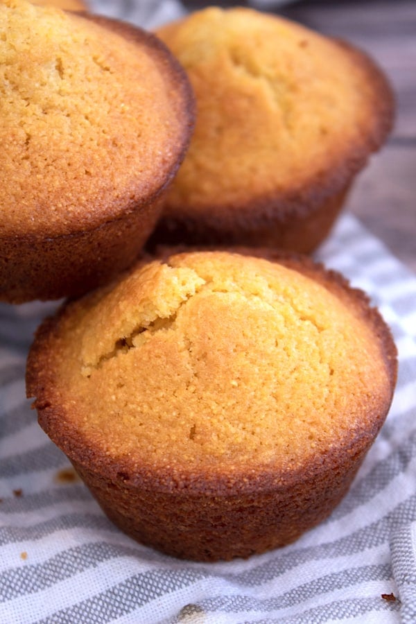 Cornbread muffins on a striped towel