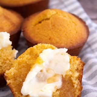 corn muffins with butter and honey slathered