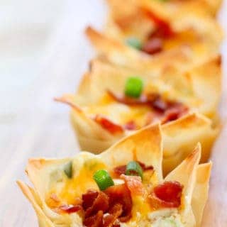 Jalapeno Popper Wontons ready to serve on board