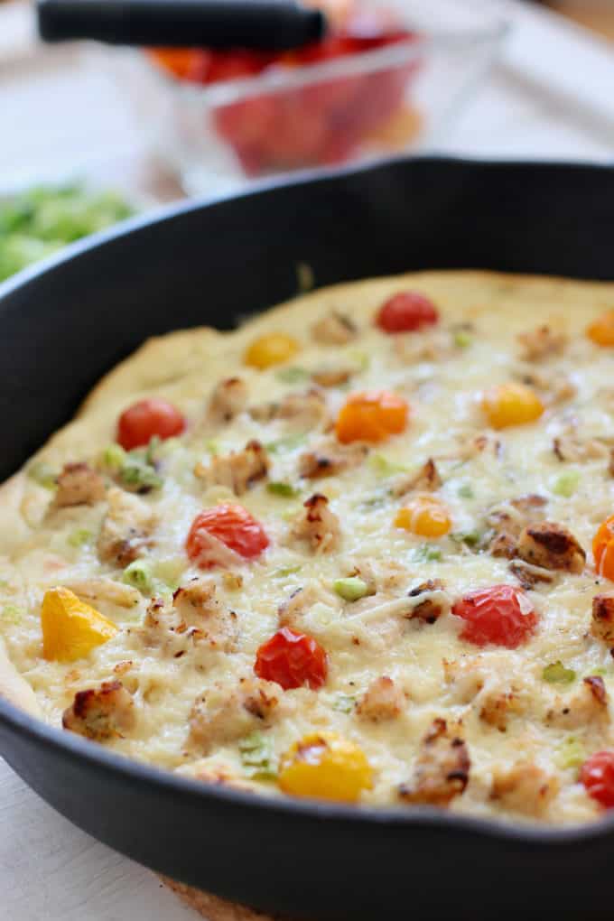 pizza out of the oven in cast iron skillet