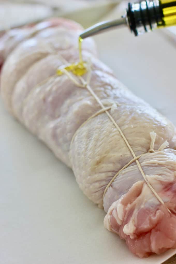 rolled turkey breast tied with string and rubbed with olive oil