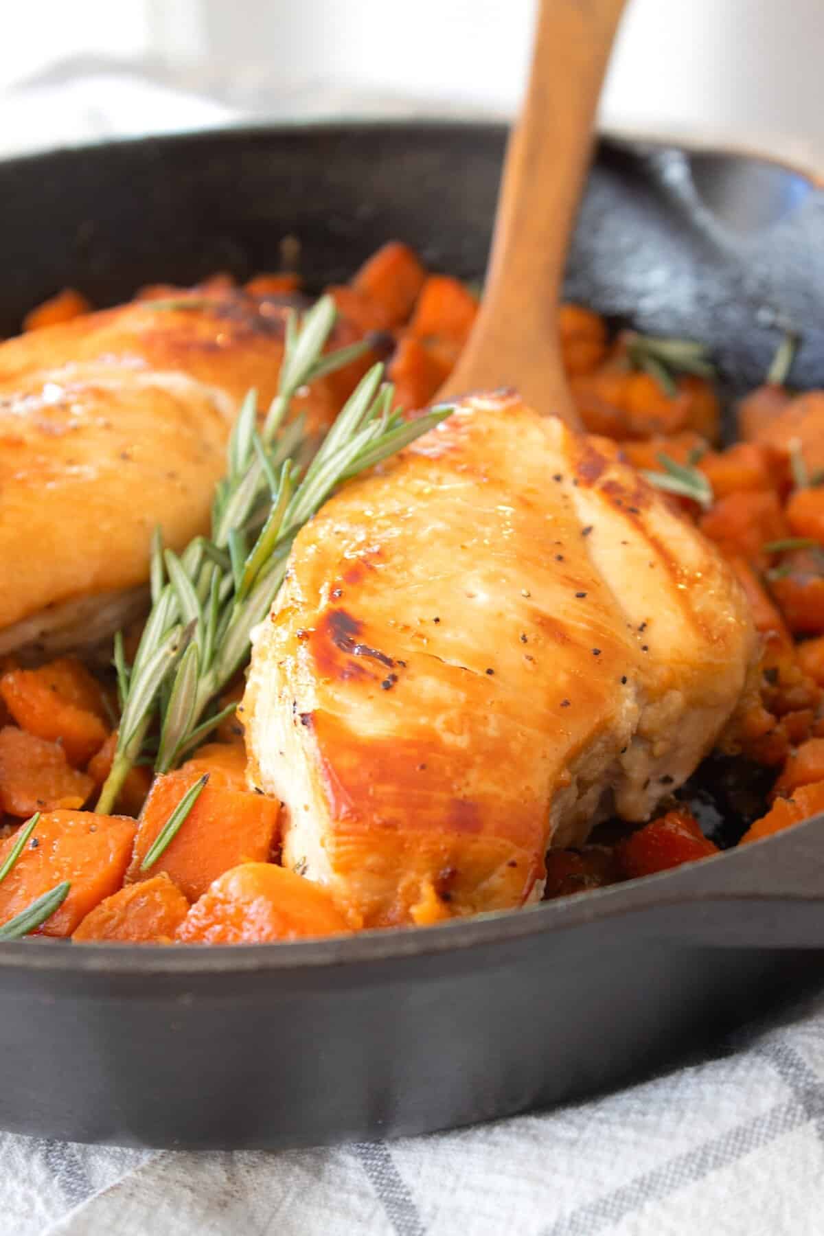 side view of chicken and sweet potatoes