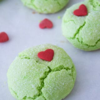 green grinch cookies with heart sprinkles