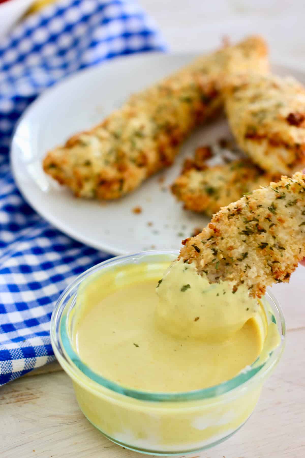 air fryer chicken tenders dipped in yogurt mustard sauce