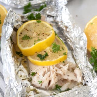 mahi mahi in a foil packet with lemon and parsley