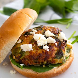 feta spinach burger with bun and feta cheese