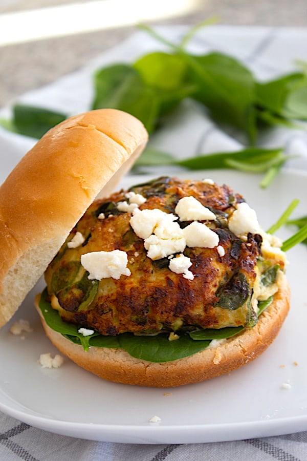 feta spinach burger with bun and feta cheese