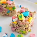 marshmallow cereal bars with lucky charms on platter