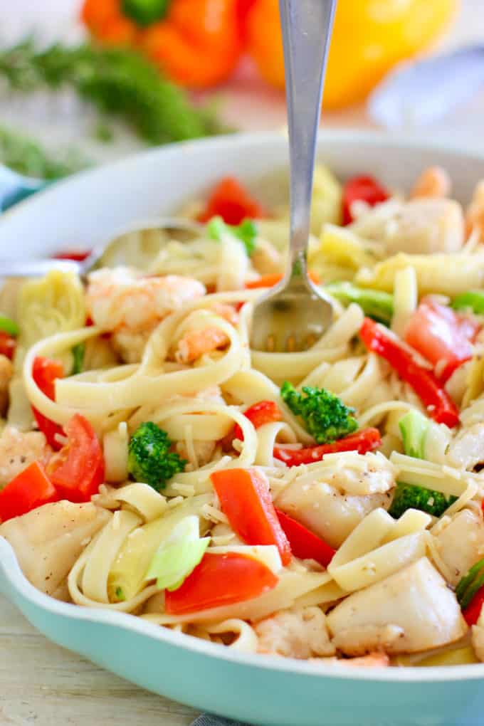 Shrimp and Scallop Pasta in a blue skillet