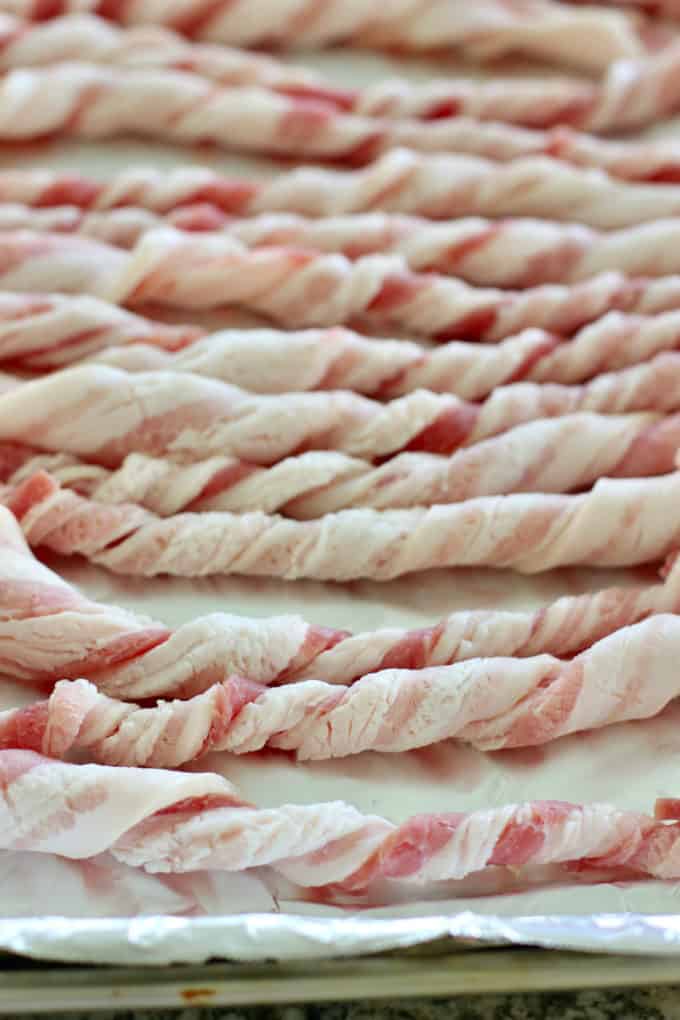 twisted bacon on a large baking sheet