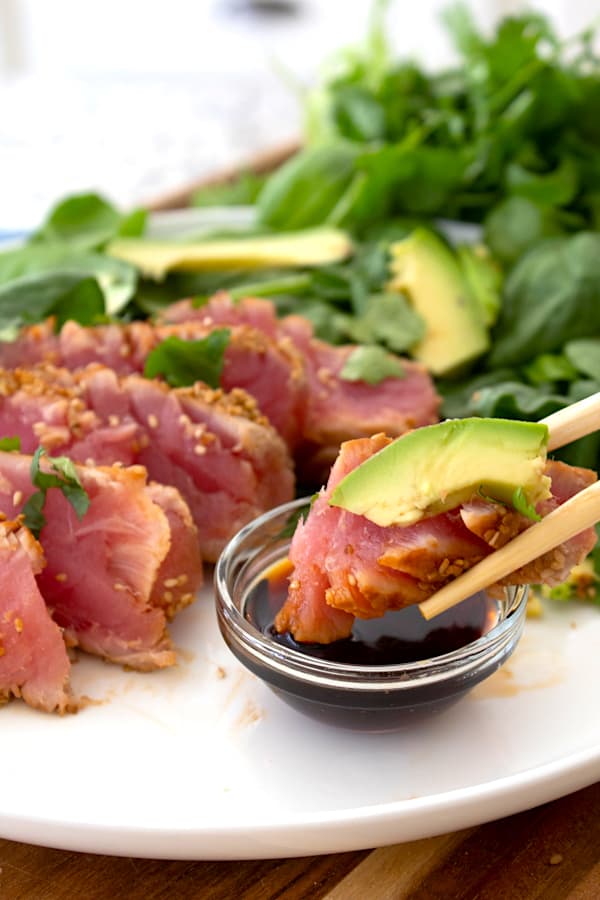 serving seared ahi tuna with avocado and soy sauce