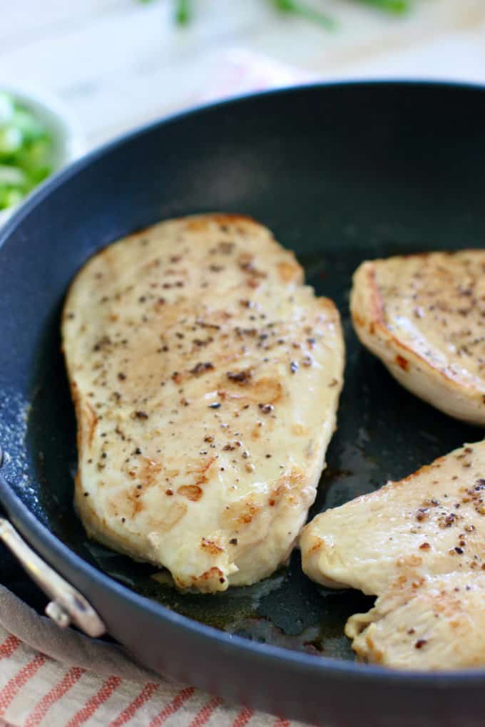 seared chicken breasts in skillet