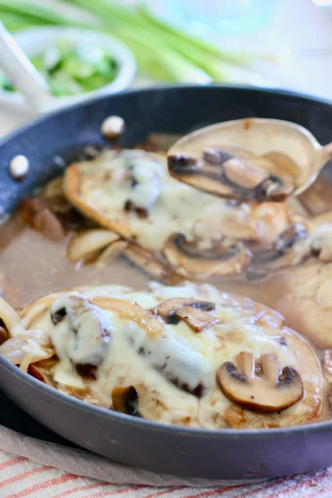 chicken breasts smothered in mushroom gravy and cheese