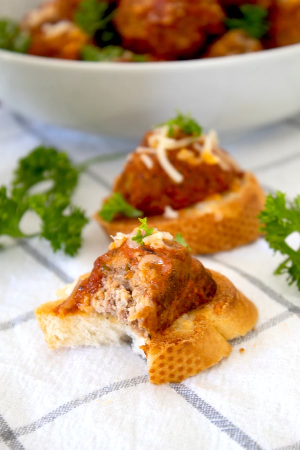 meatball being served on a crostini