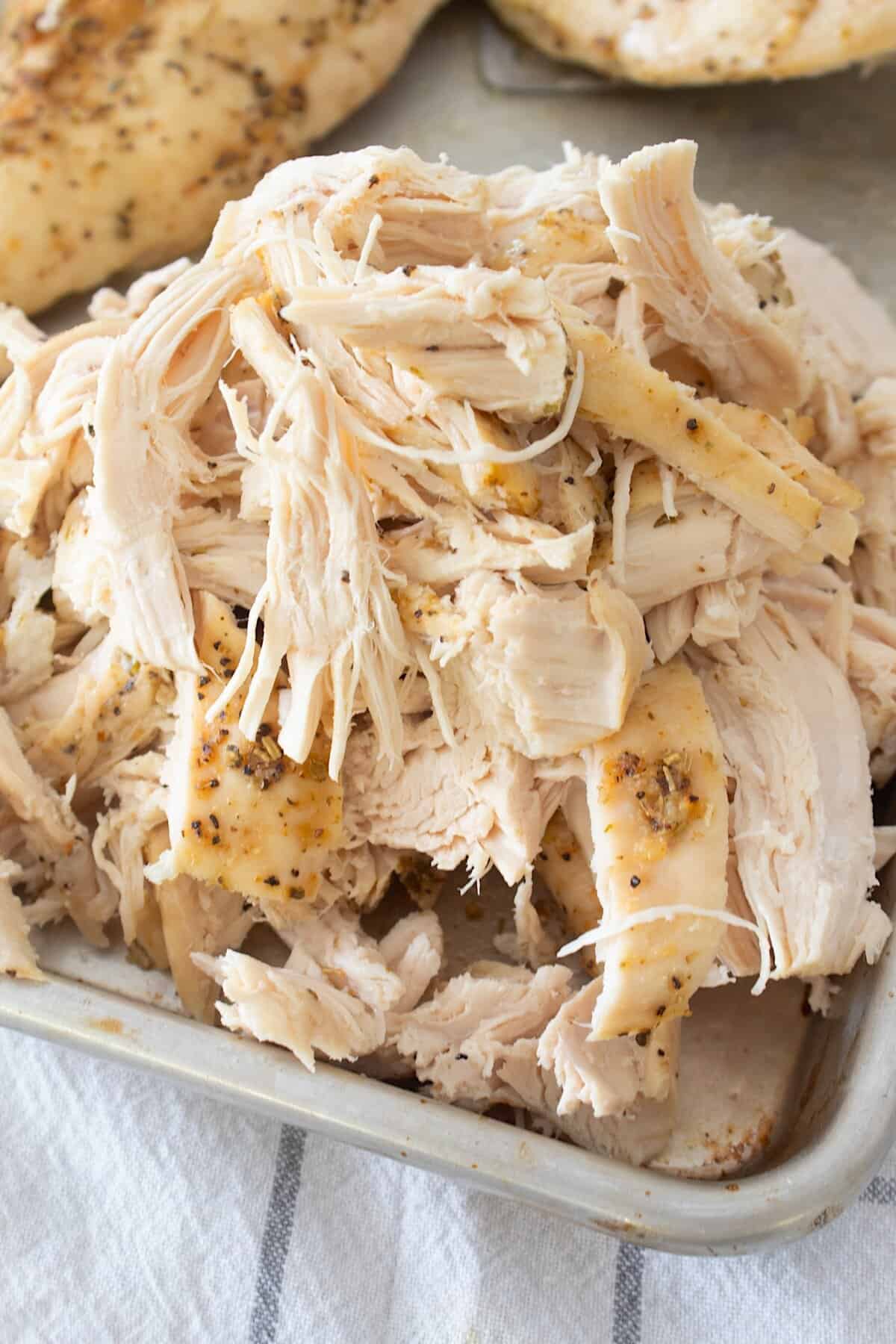 shredded chicken on a sheet pan