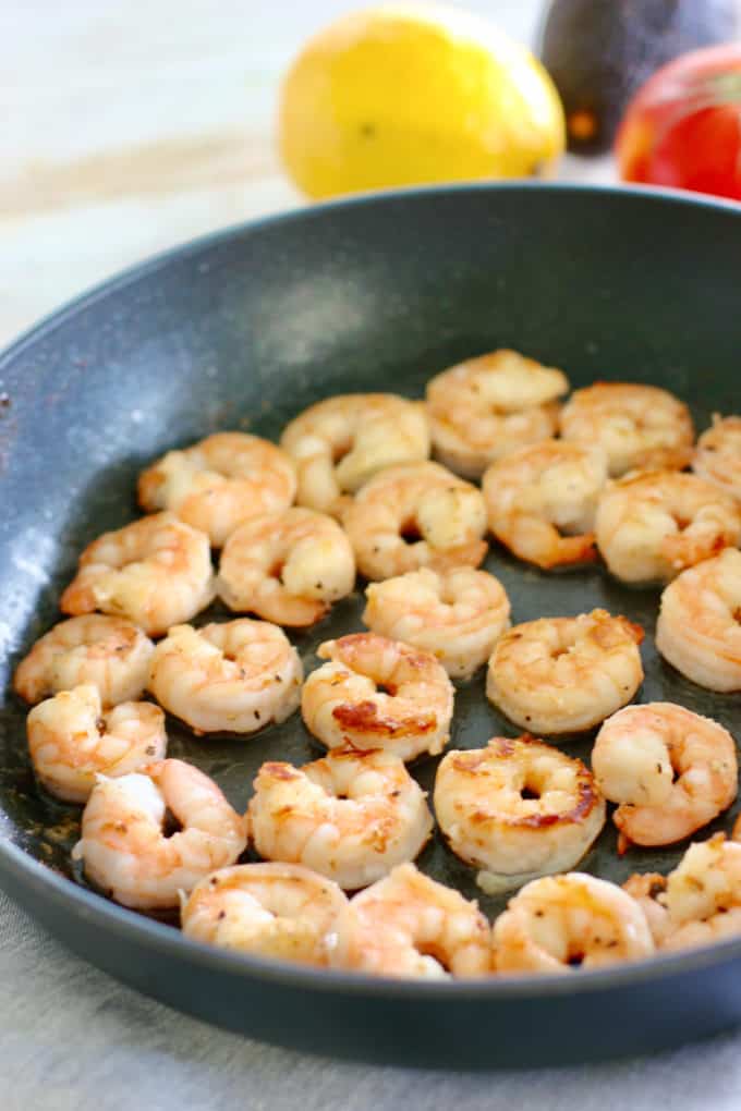 shrimp in a frying pan after being seared.