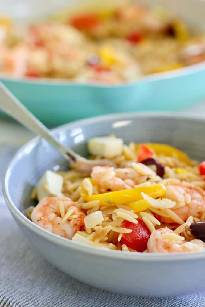 Meditteranean Shrimp and Orzo in a gray bowl ready to eat