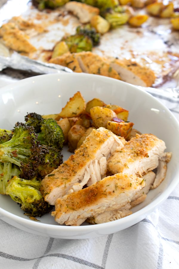 white ceramic bowl with chicken dinner inside