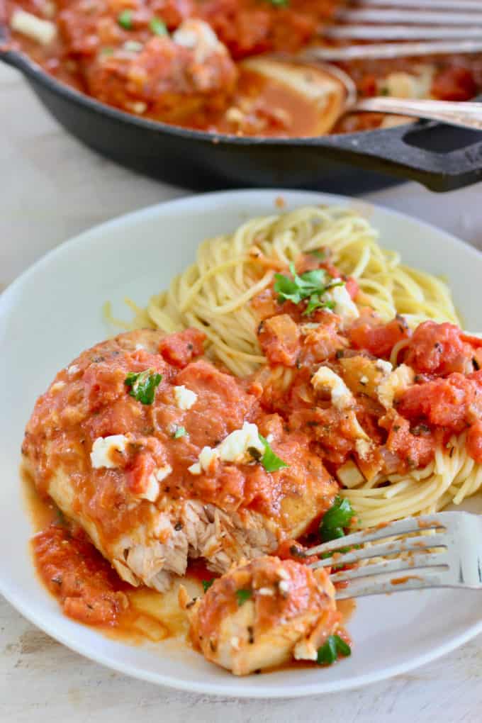 Fish in tomato sauce served with pasta
